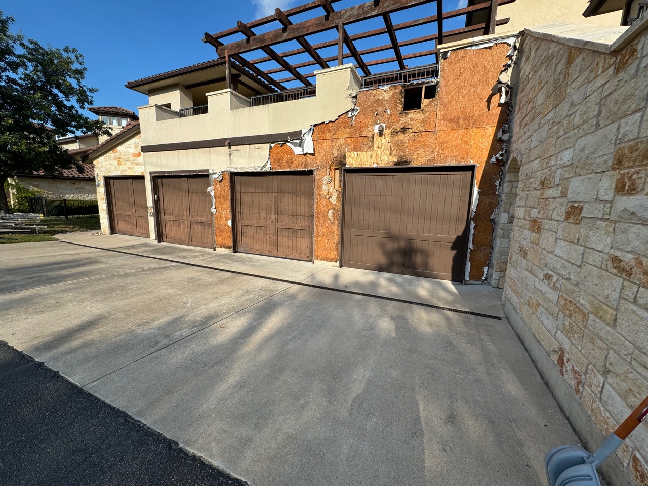 Garage exterior opened for waterproofing repair