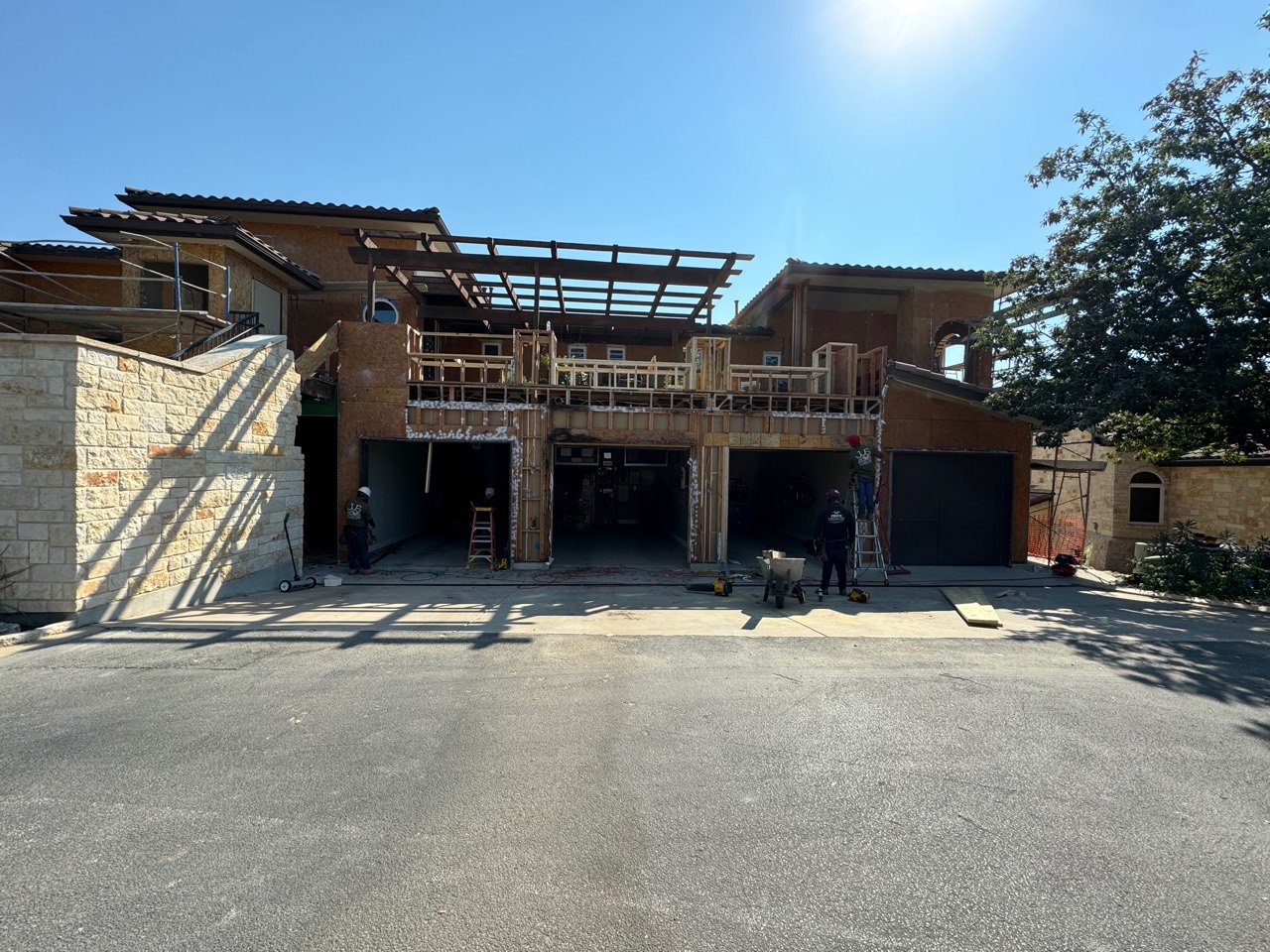 Crews rebuilding the garage exterior wall